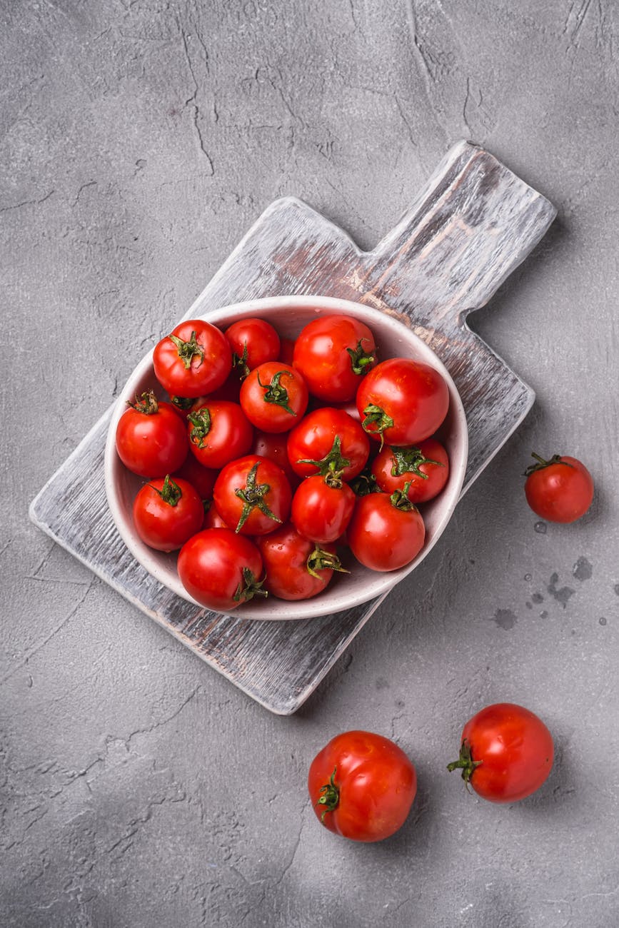 fresh ripe tomatoes in bowl